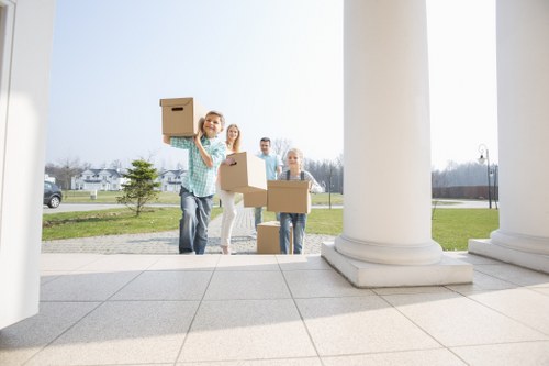 Packed moving boxes and furniture prepared for Hounslow removals