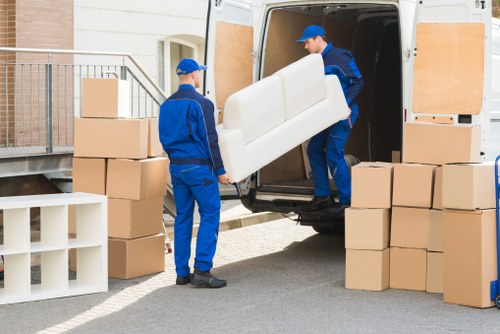 Removal team preparing a safe home move with packing equipment