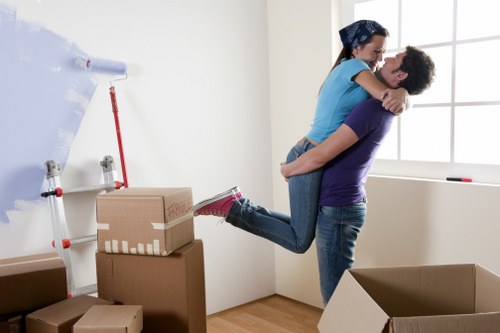 Office removals team preparing desks and boxes for a move in Hounslow