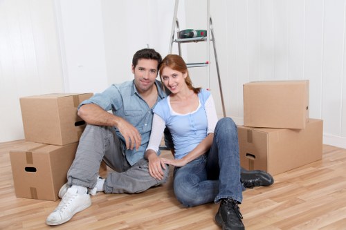 Boxes and furniture being loaded into a removals van for a flat move in Hounslow