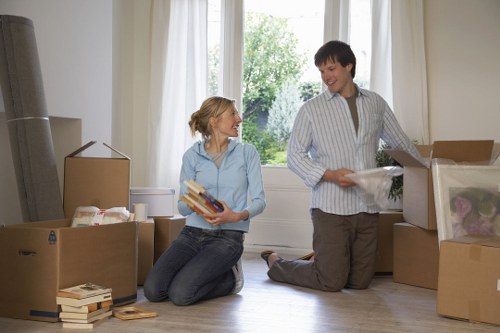 Removal team loading furniture for a Hounslow home move