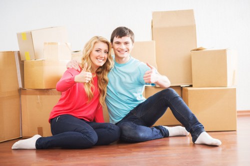 Loading furniture into a van for a Hounslow house move