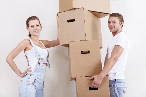 Loading boxes and furniture into a removal truck in Hounslow