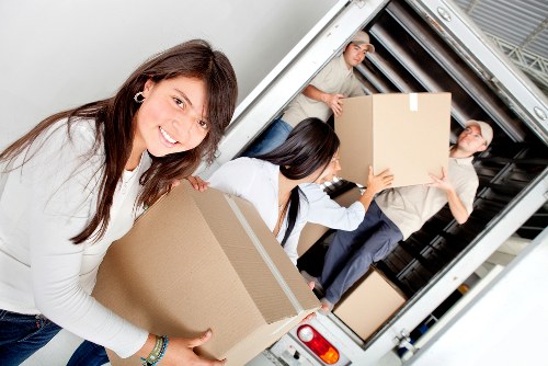 Careful unloading of household items at a Hounslow property