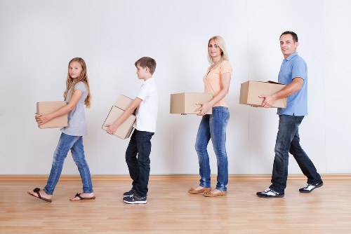 Family preparing for a house move with local removals support in Hounslow