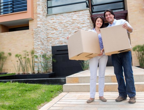 Professional movers handling stairs and access challenges in a Hounslow property