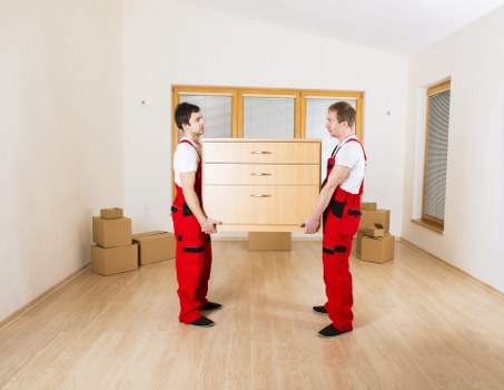 Packed boxes and furniture ready for transport