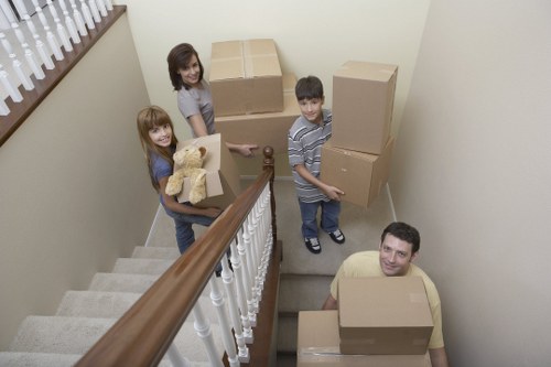 Loading furniture and boxes into a moving van for a Hounslow move